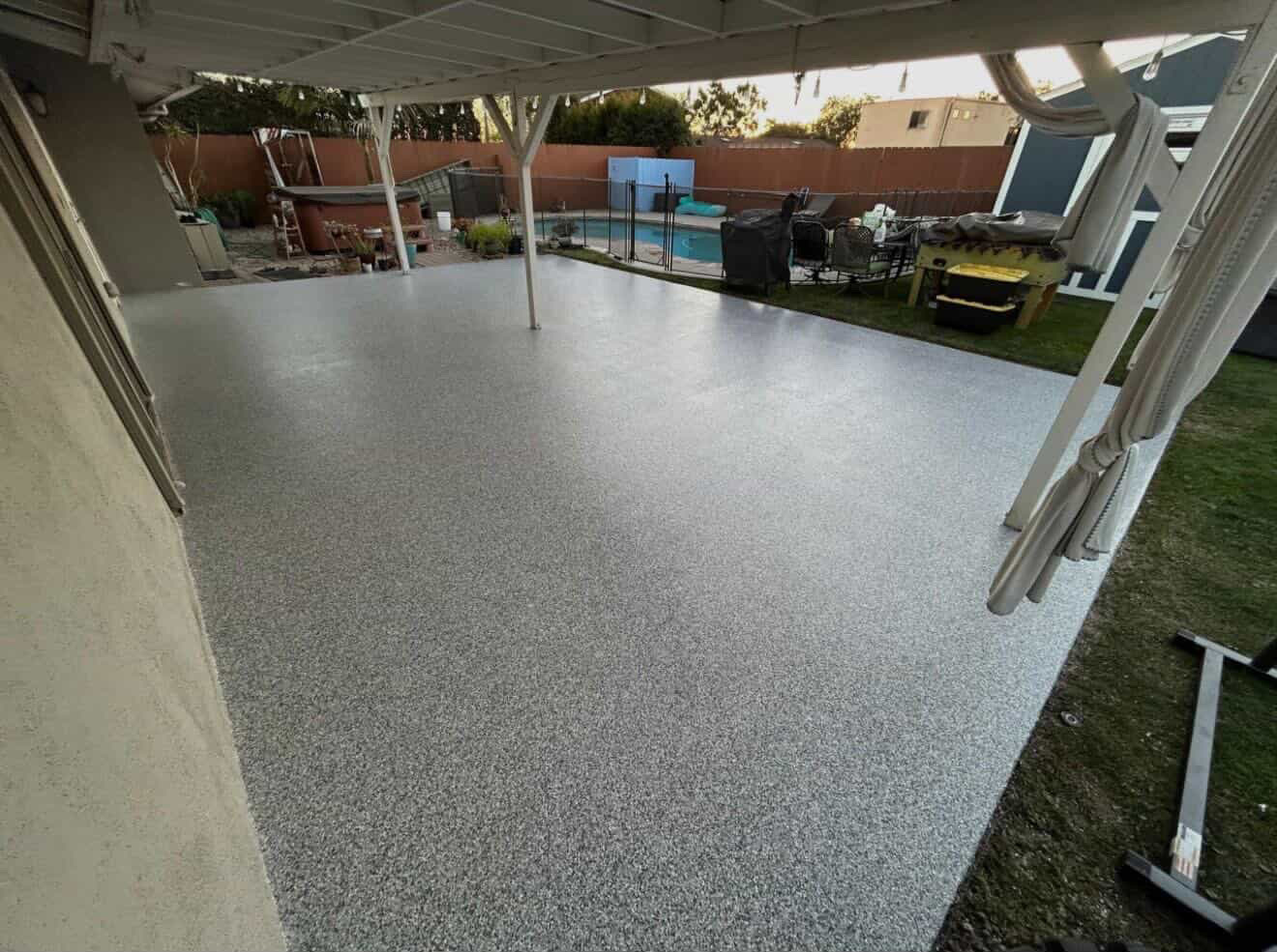 Flake epoxy covered patio install by Epoxy Solutions